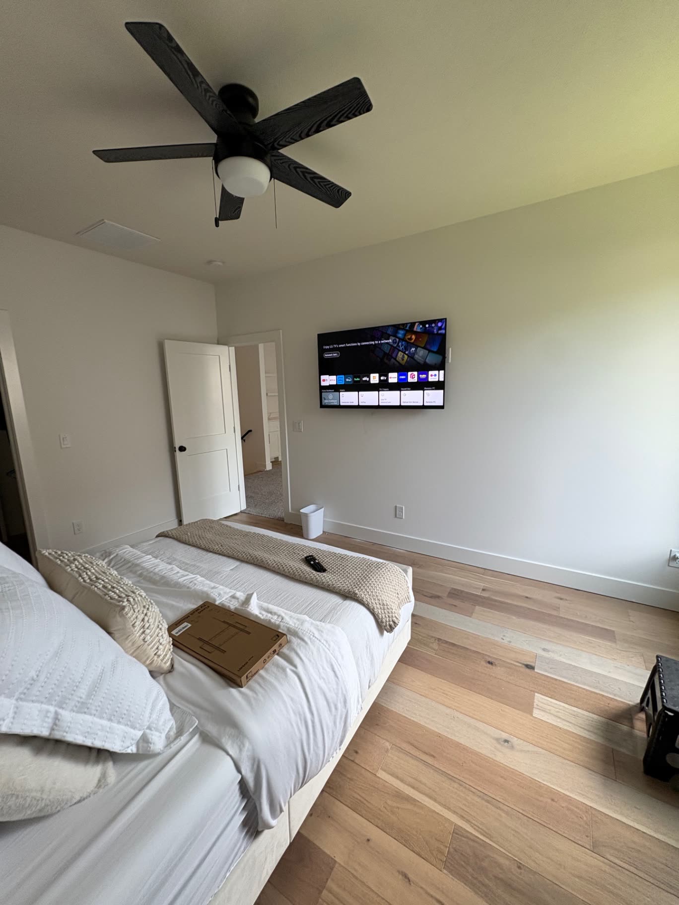 TV with a soundbar mounted directly underneath